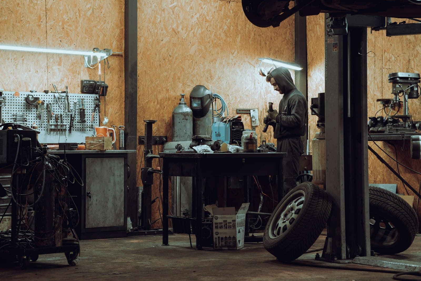 Mechanic servicing a fleet vehicle